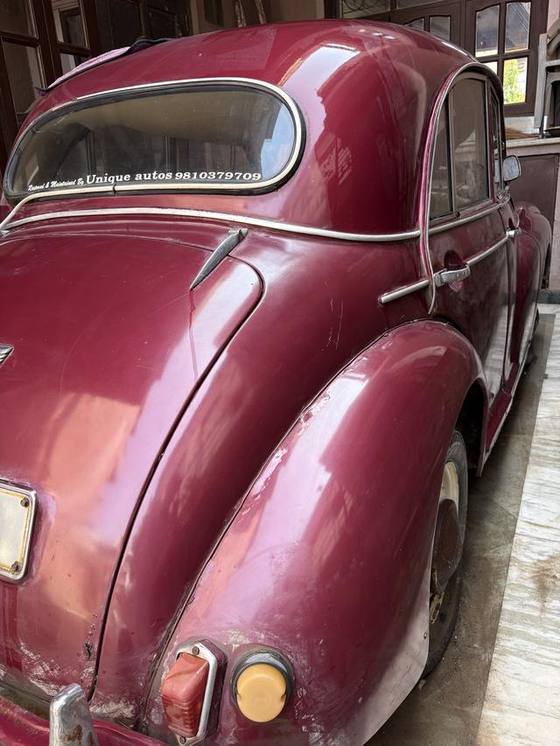 Boot lid, winged badge and curved rear screen